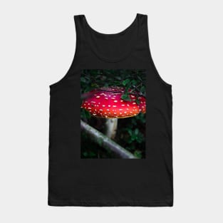 Bright red magical mushroom with white spots deep in the forest Tank Top